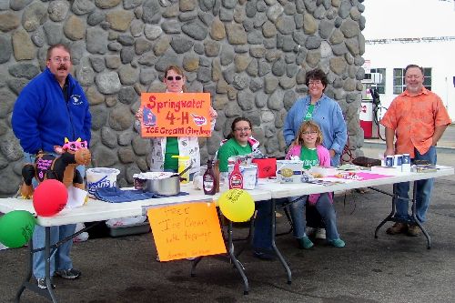   Members and leaders of the Springwater 4-H offer ice cream during the Classic Car Cruise, September 17, 2011